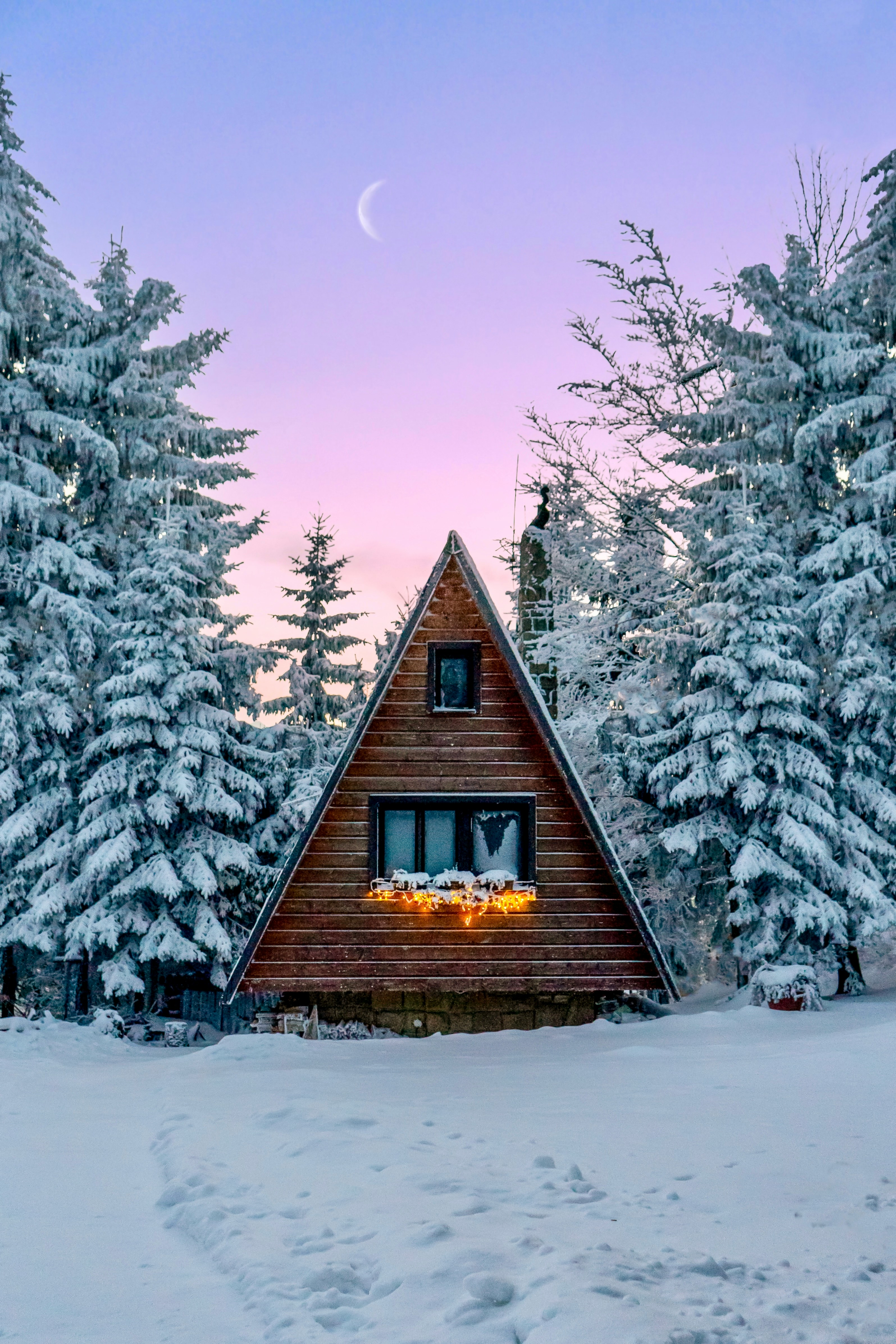 A-frame cabin in snow